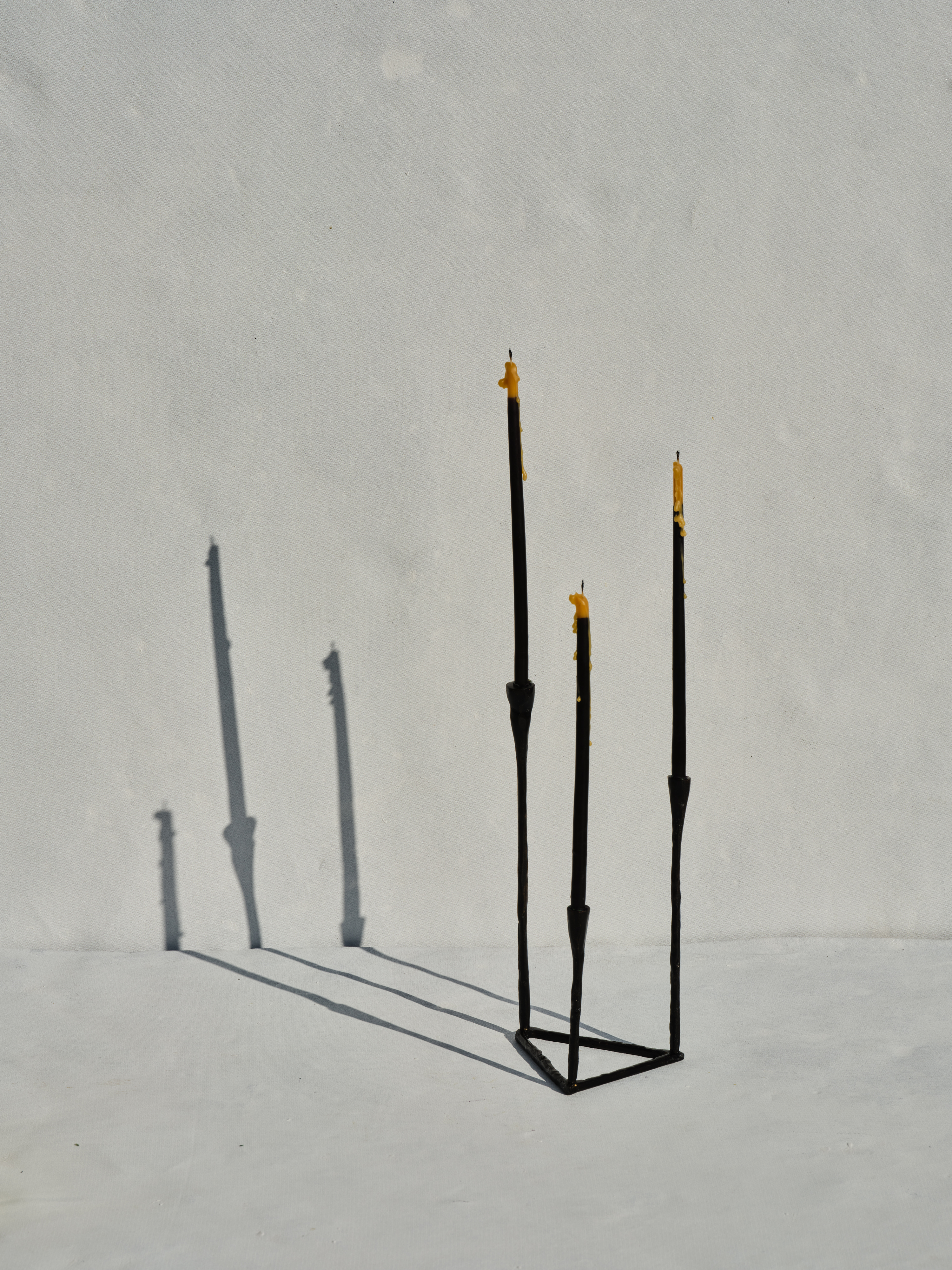 MOIRAI - Black brass candle holder with ‘Δ’ Delta-shape for multiple candles